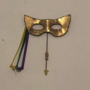 Gold Tone Mask Brooch with Colorful Ribbons